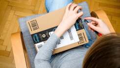 Person opening Amazon package
