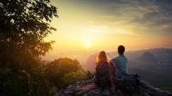 Couple watching the sunrise.