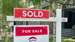 "sold" sign outside home