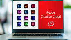Logos for the Adobe Creative Cloud suite displayed on a laptop