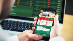 Businessman using betting app