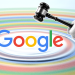 A photo illustration of a hand holding a gavel over the Google logo against a rainbow background