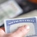 Person holding social security card
