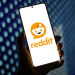 Reddit logo on a smartphone