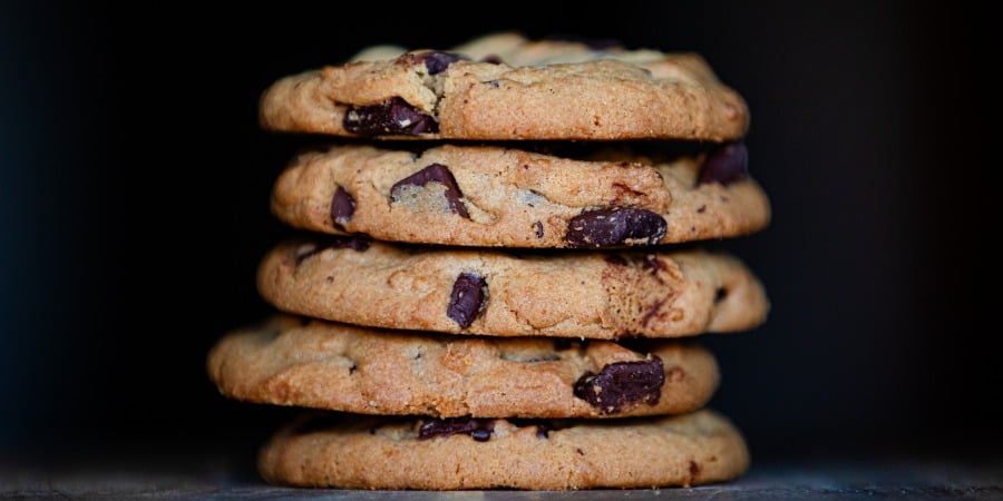 Close-up of a stack of chocolate chip cookies.