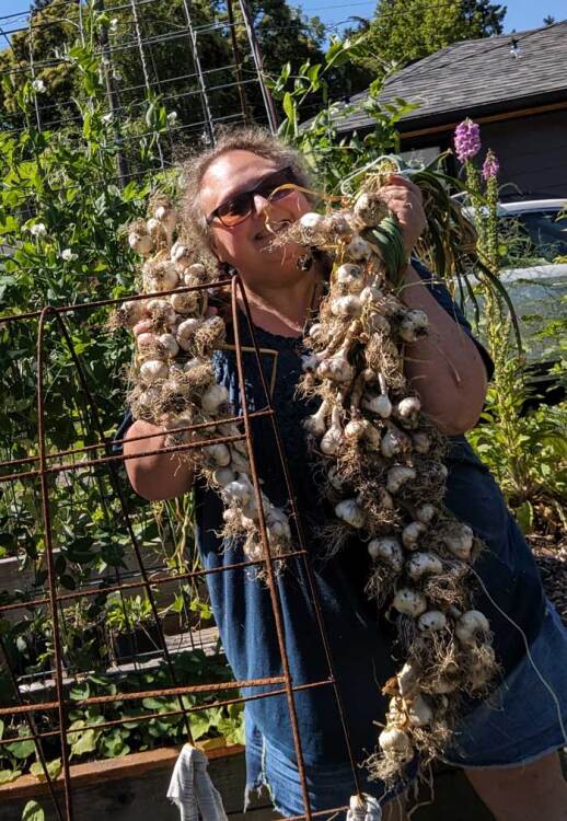 The author and her garlic braids, 2023